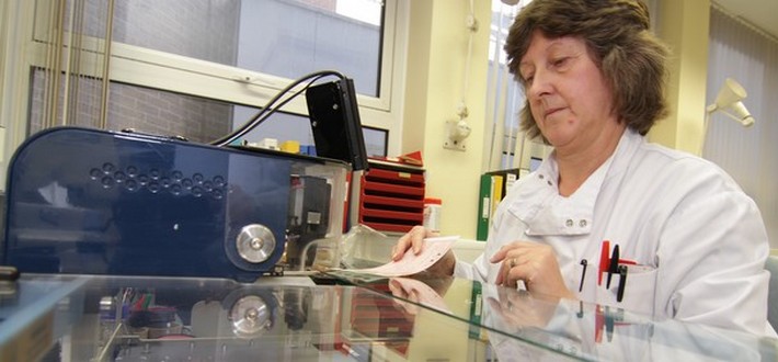 scientist testing newborn screening samples