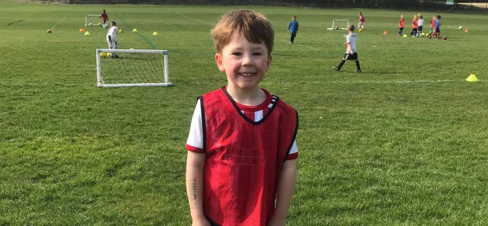 Jack playing football