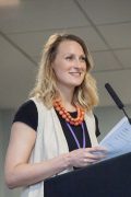 Profile picture of Claire Green giving a presentation