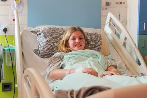 Millie in hospital bed