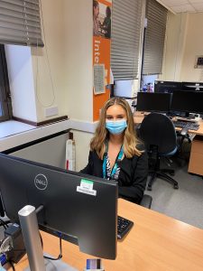 Olivia Jubb at desk