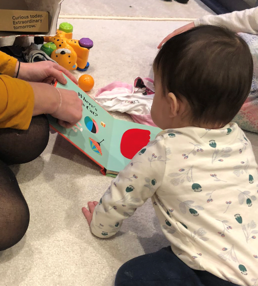 child looking at book