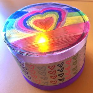 painted tea light with rainbow colours
